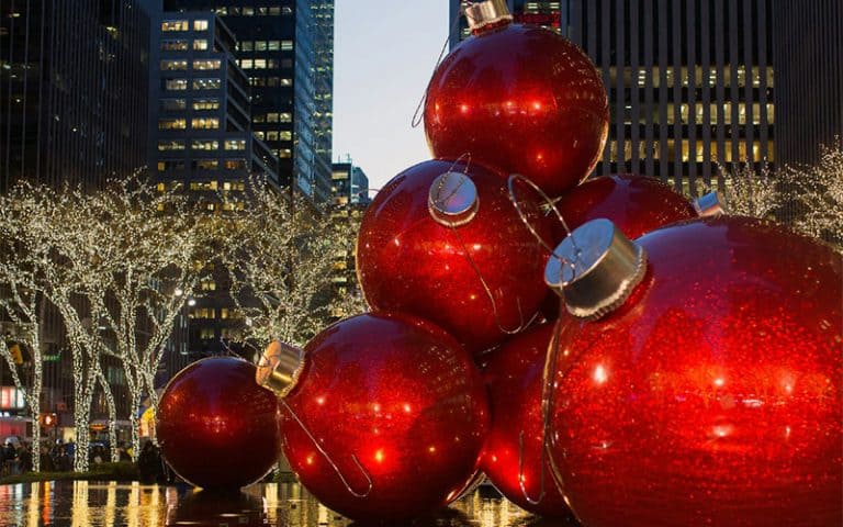 Large red baubles decorating a street