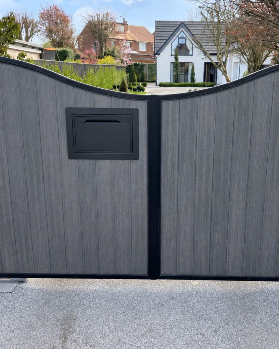 A real customer installation of the Chelsea Built-In Parcel Box in Anthracite, integrated directly into the entrance gate. The dark finish picks…